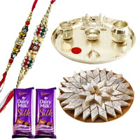 An Exclusive Gift Hamper with Silver Plated Thali,...