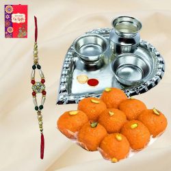 Trendy Rakhi and Silver Plated Paan Shaped Puja Th...
