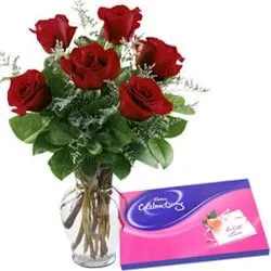 Book Online Red Roses in Vase with Cadbury Celebration Chocolates