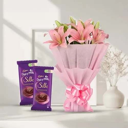 Shop for Pink Lilies Bouquet with Dairy Milk Silk