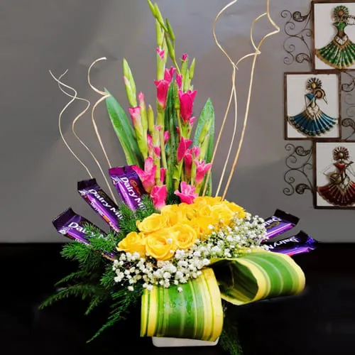 Dazzling Arrangement of Assorted Flowers with Cadbury Chocolate