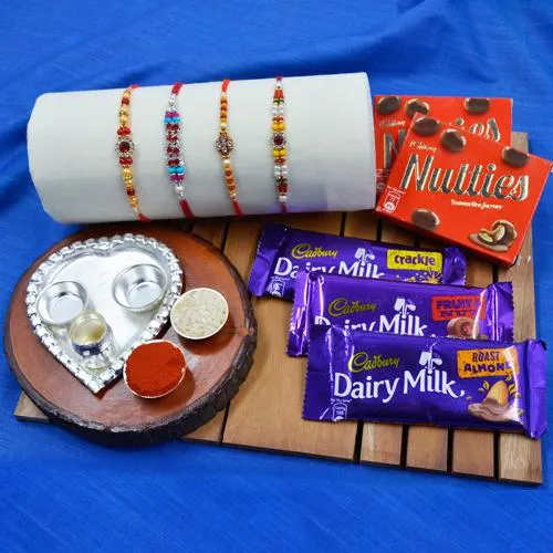 Charming Stone Rakhi Set with Paan Shape Thali n Assorted Chocolates