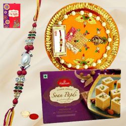 Soan Papri from <font color=#FF0000>Haldiram</font> and Rakhi Thali along Rakhi, Roli Tilak and Chawal Soan Papri from <font color=#FF0000>Haldiram</font> and Rakhi Thali along Rakhi, Roli Tilak and Chawal