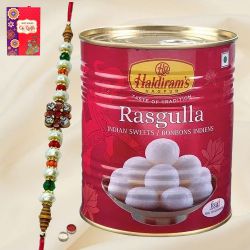 Potent Rakhi Adornment of Haldiram Rasgulla and Designer Rakhi Potent Rakhi Adornment of Haldiram Rasgulla and Designer Rakhi