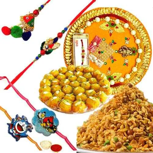 Ecstatic Combo of Boondi Ladoo, Masala Peanuts, Rakhi Thali, 1 Bhaiya Bhabhi Rakhi Set and 2 Kids Rakhi