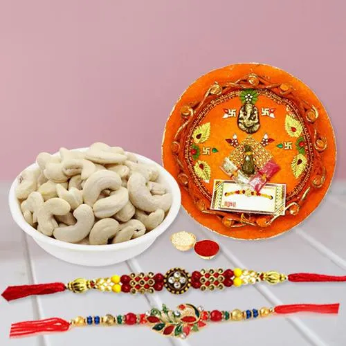 Admirable Gift of Two Rakhis with Cashews n Puja Thali